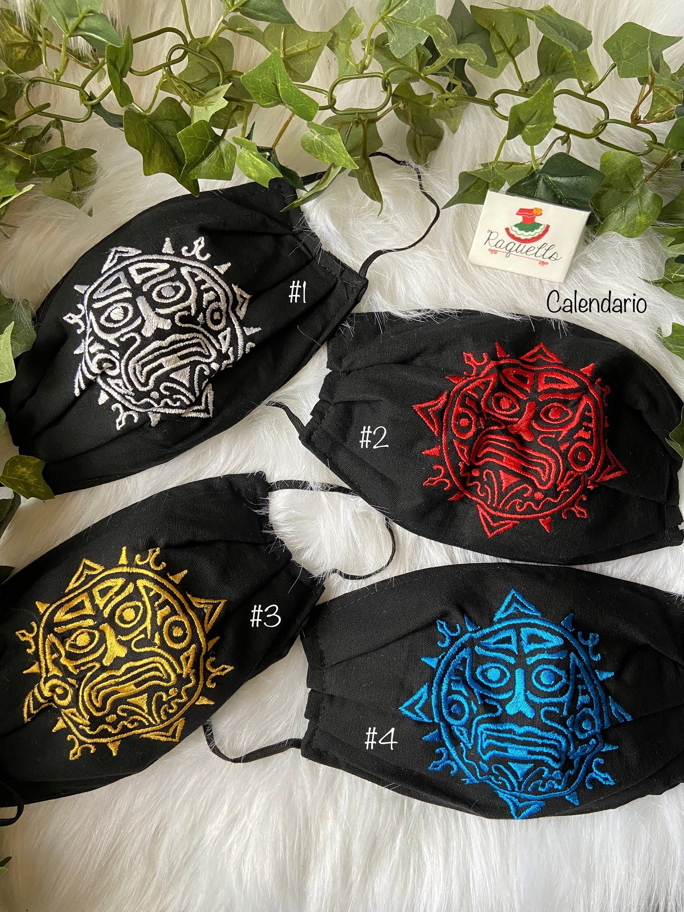 Image of Unisex Face Mask - Embroidered Aztec image with filter sewed-in