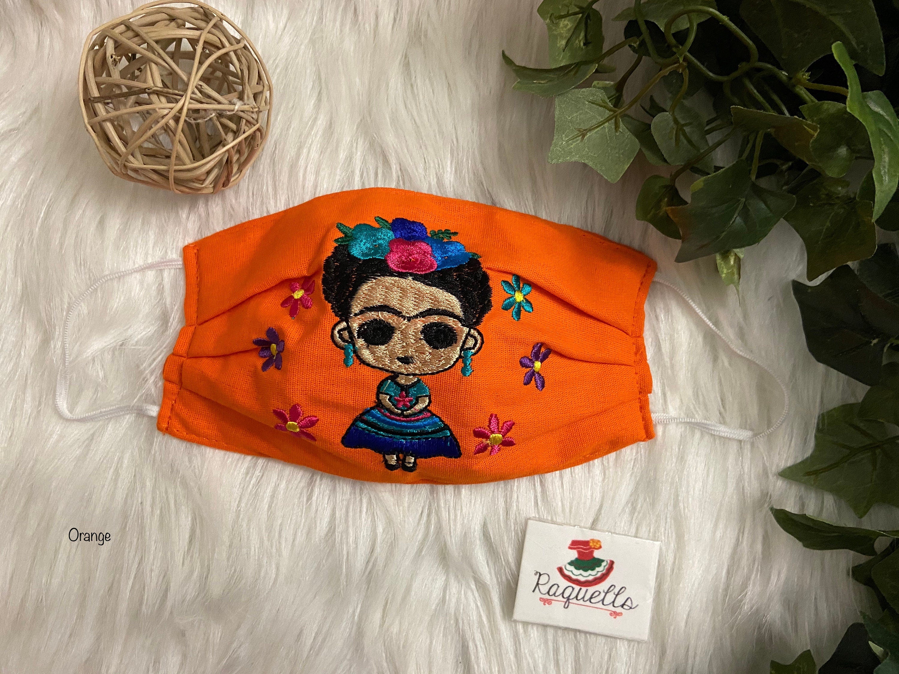 Image of FRIDA Embroidered Face Masks with filter attached