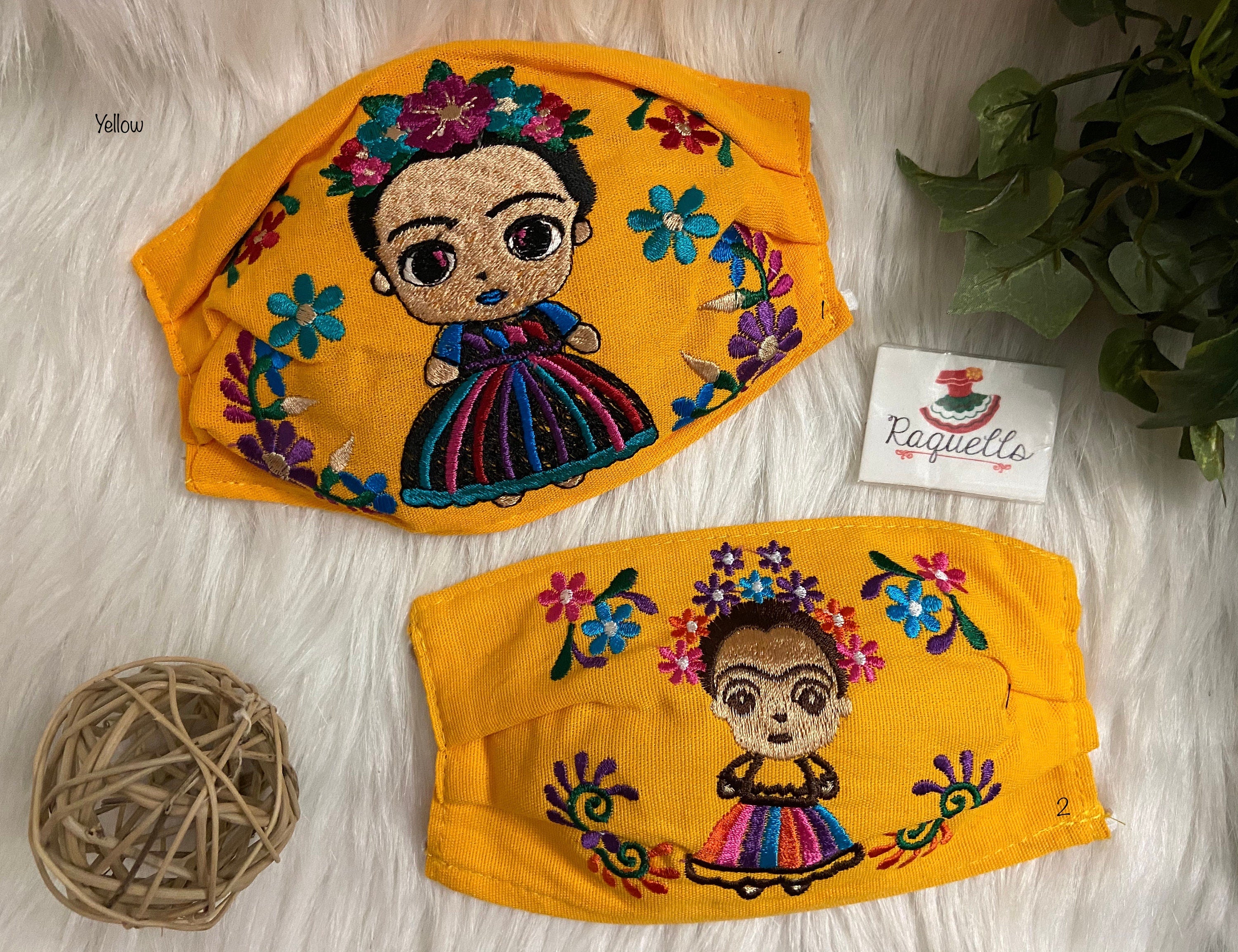 Image of FRIDA Embroidered Face Masks with filter attached