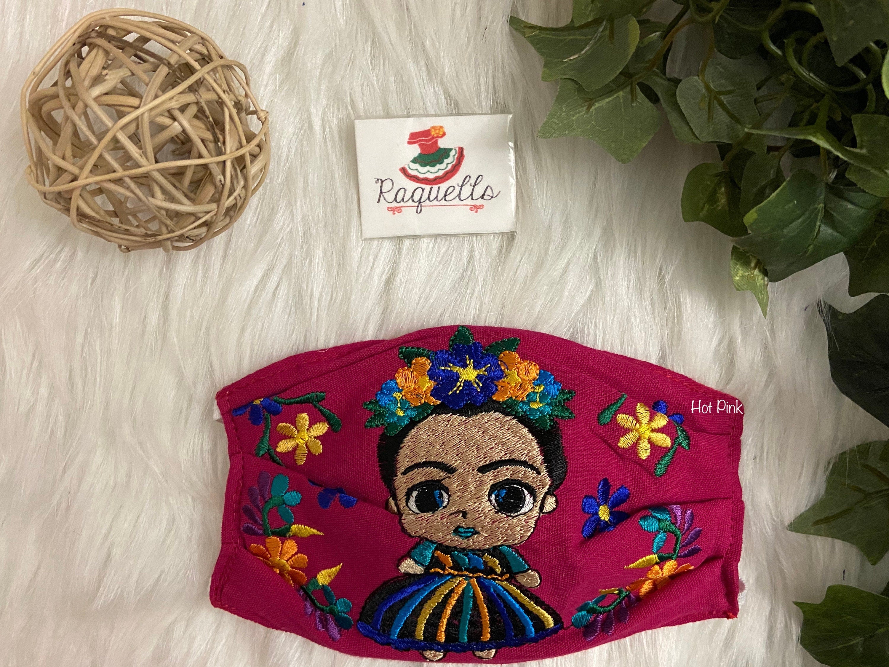 Image of FRIDA Embroidered Face Masks with filter attached