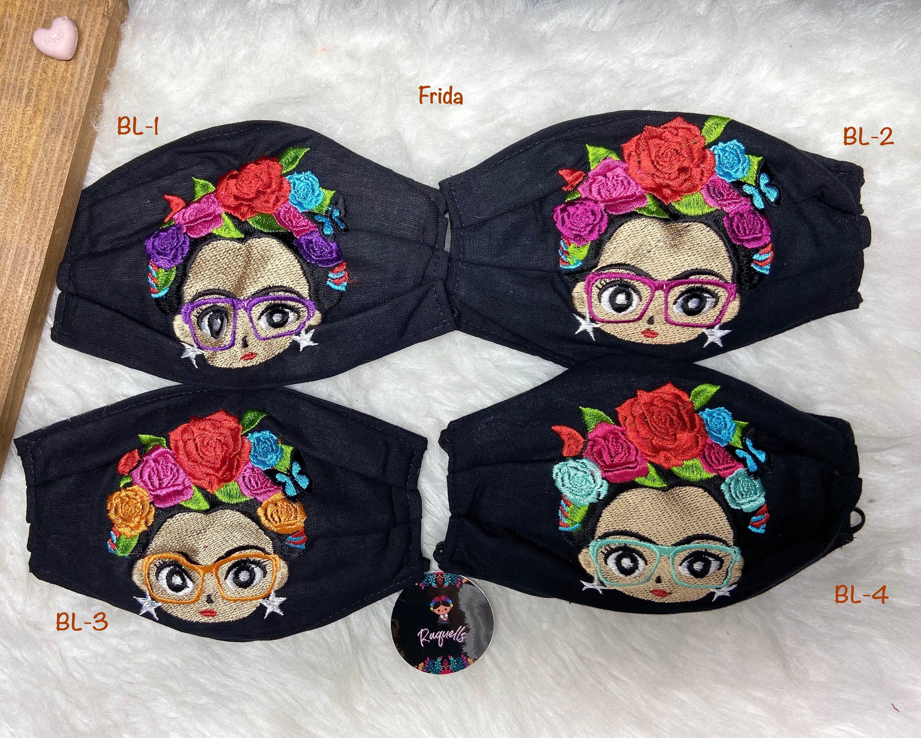 Image of FRIDA Embroidered Face Masks with filter attached