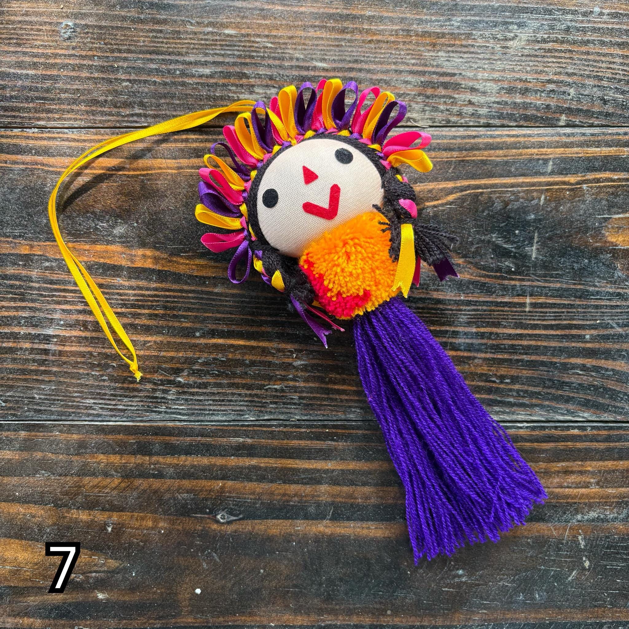 Image of Artisan Tassel Charm Featuring Lele Doll - Playful Addition to Your Everyday Essentials Handmade Tassel Charm-Car Decor, backpack/bag charm