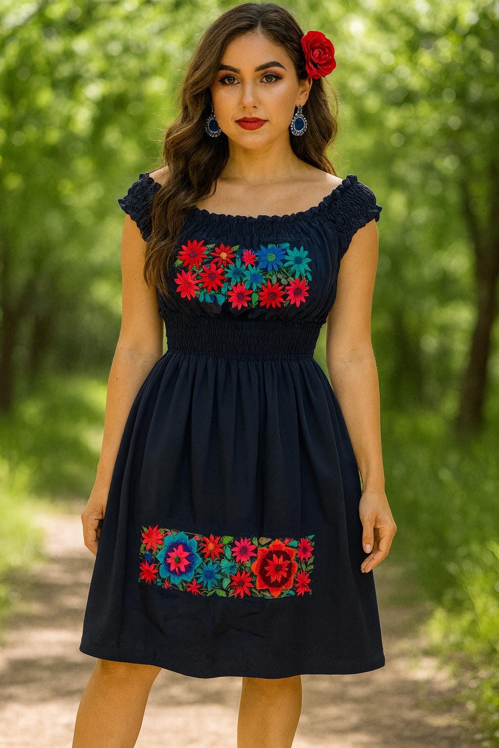 Image of May include: Navy blue off-the-shoulder dress with colorful floral embroidery. The dress features a fitted bodice and a flared skirt. The embroidery includes red, blue, and green flowers. A perfect choice for a summer day.